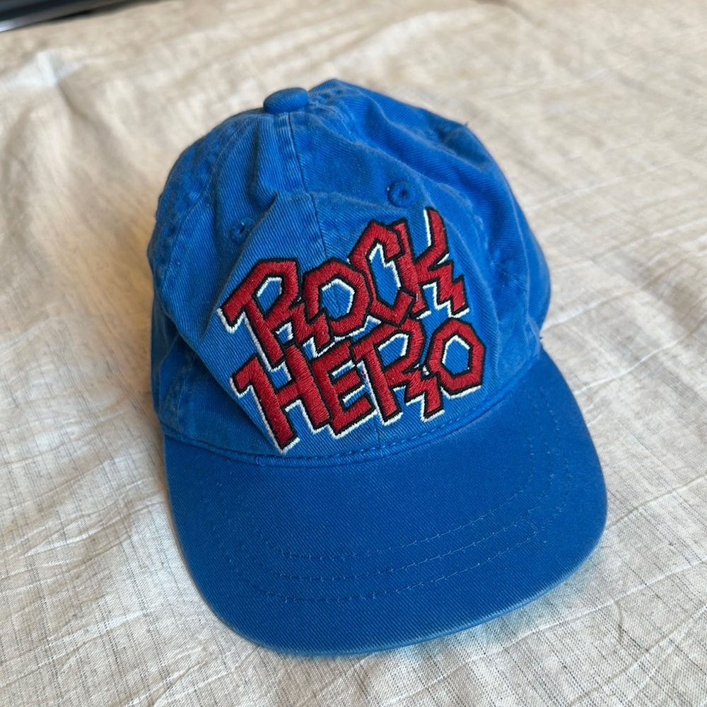 Place Blue Cap with Red Stitching